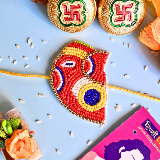 Traditional Ganeshji Beaded Thread Rakhi with Roli Chawal for Brother