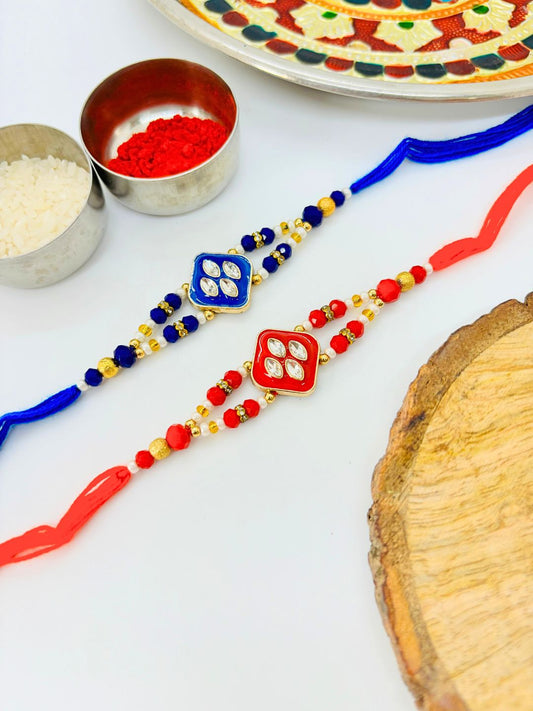 Traditional Meenakari Kundan Rakhi with Roli Chawal for Brother - Red Blue (Pack of 2)