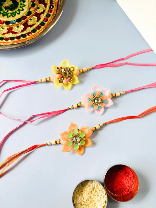 Embellished Floral Rakhi with Roli Chawal for Brother (Pack of 3)