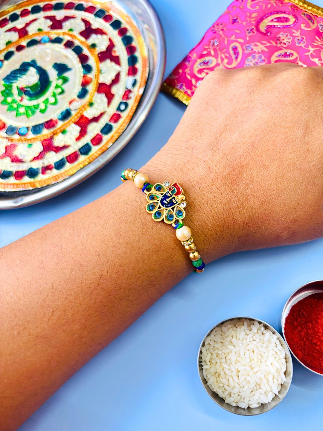 Traditional Krishna ji Kundan Meenakari Rakhi with Roli Chawal