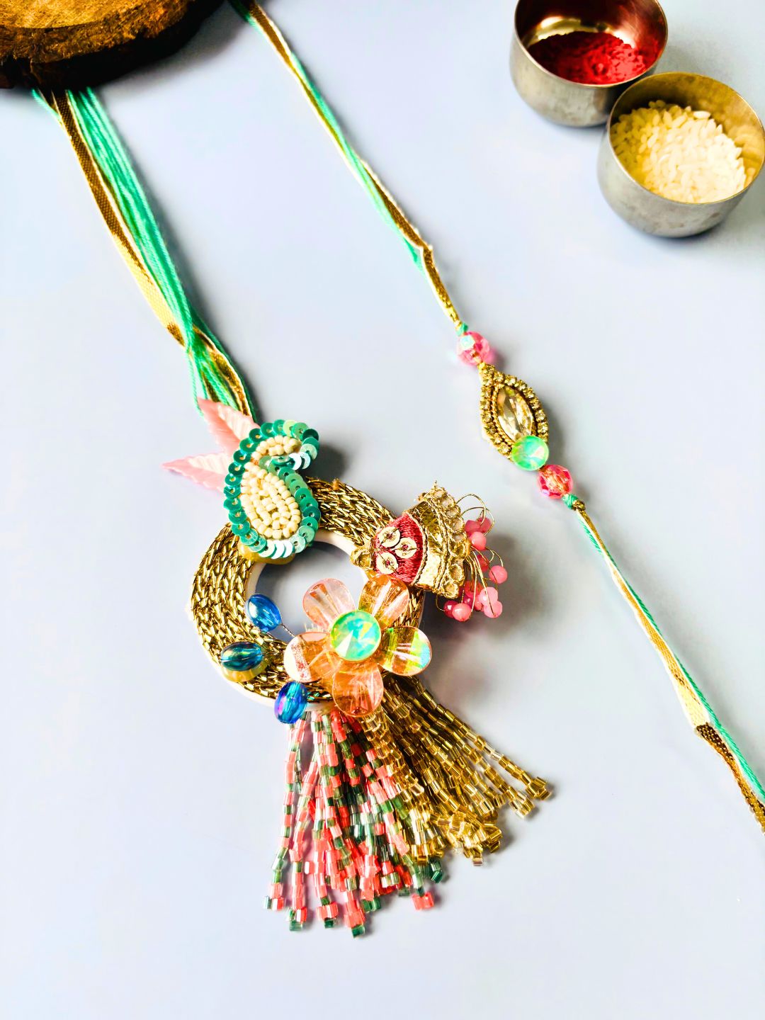 Peacock and Stone Accent Lumba Rakhi Set for Bhaiya Bhabhi with Roli Chawal