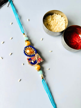 Blue Embellished Lumba Rakhi Set for Bhaiya Bhabhi with Roli Chawal