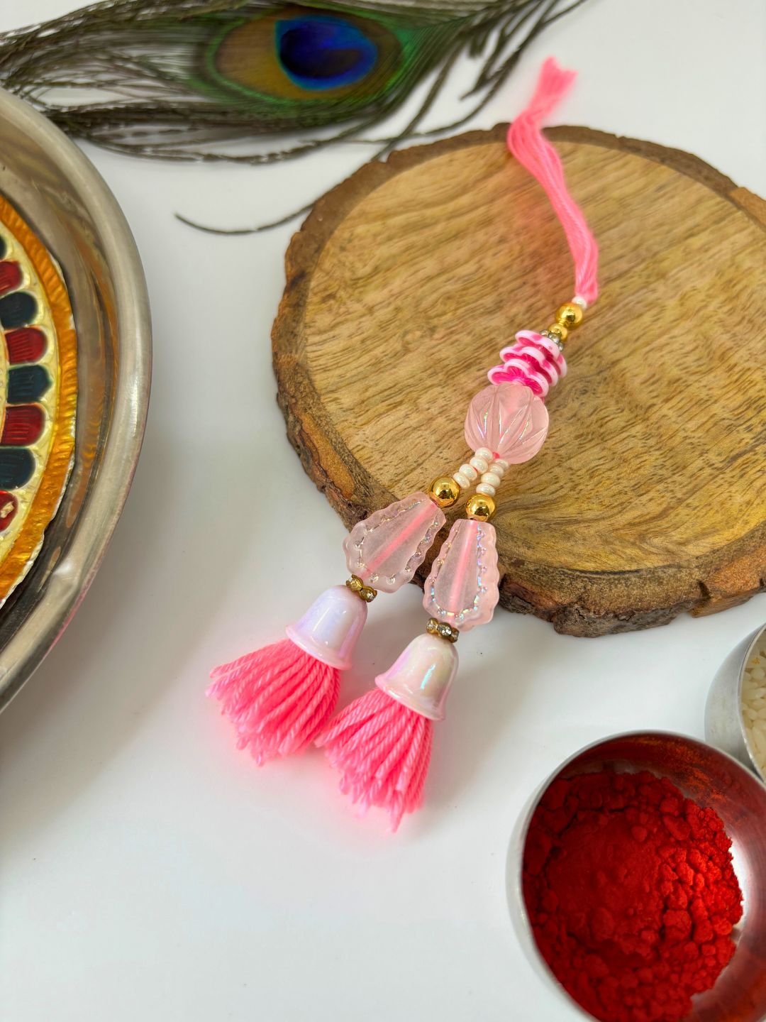 Pink Tassel Lumba Rakhi with Roli Chawal