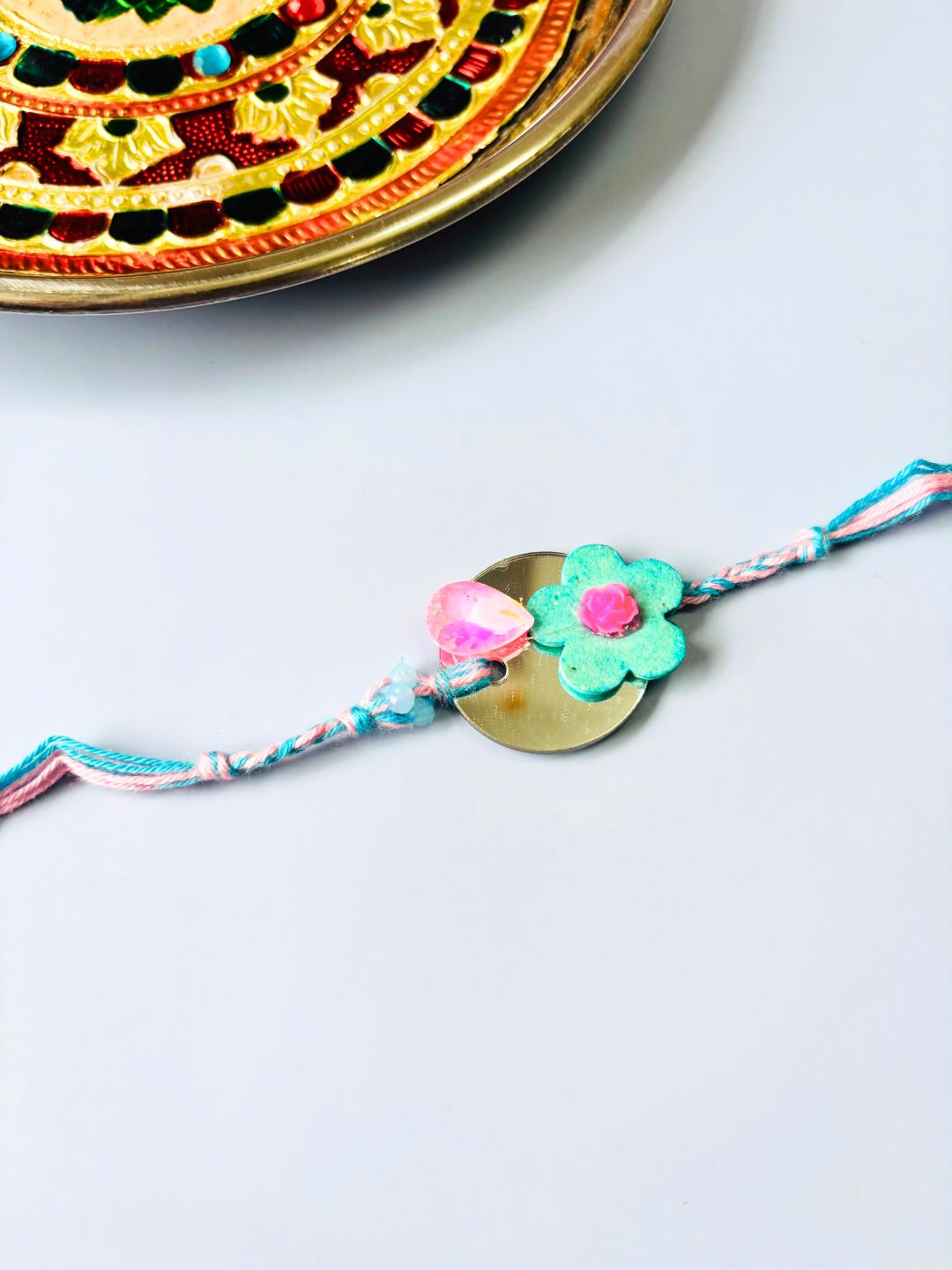 Floral Mirror Work Lumba Rakhi Set for Bhaiya Bhabhi with Roli Chawal