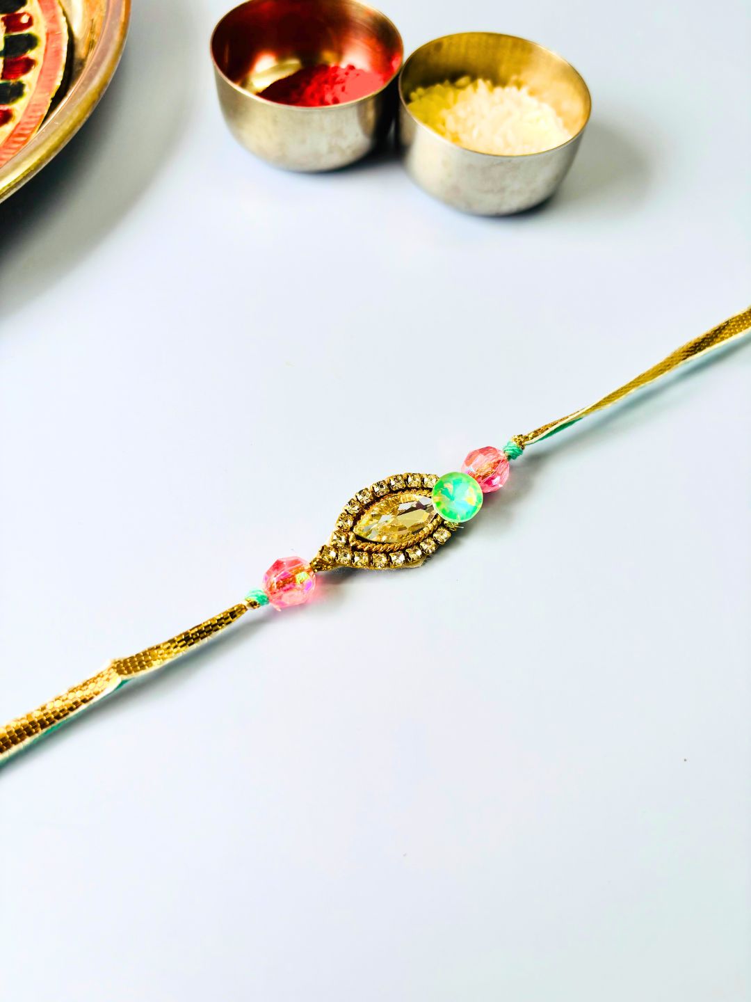 Peacock and Stone Accent Lumba Rakhi Set for Bhaiya Bhabhi with Roli Chawal