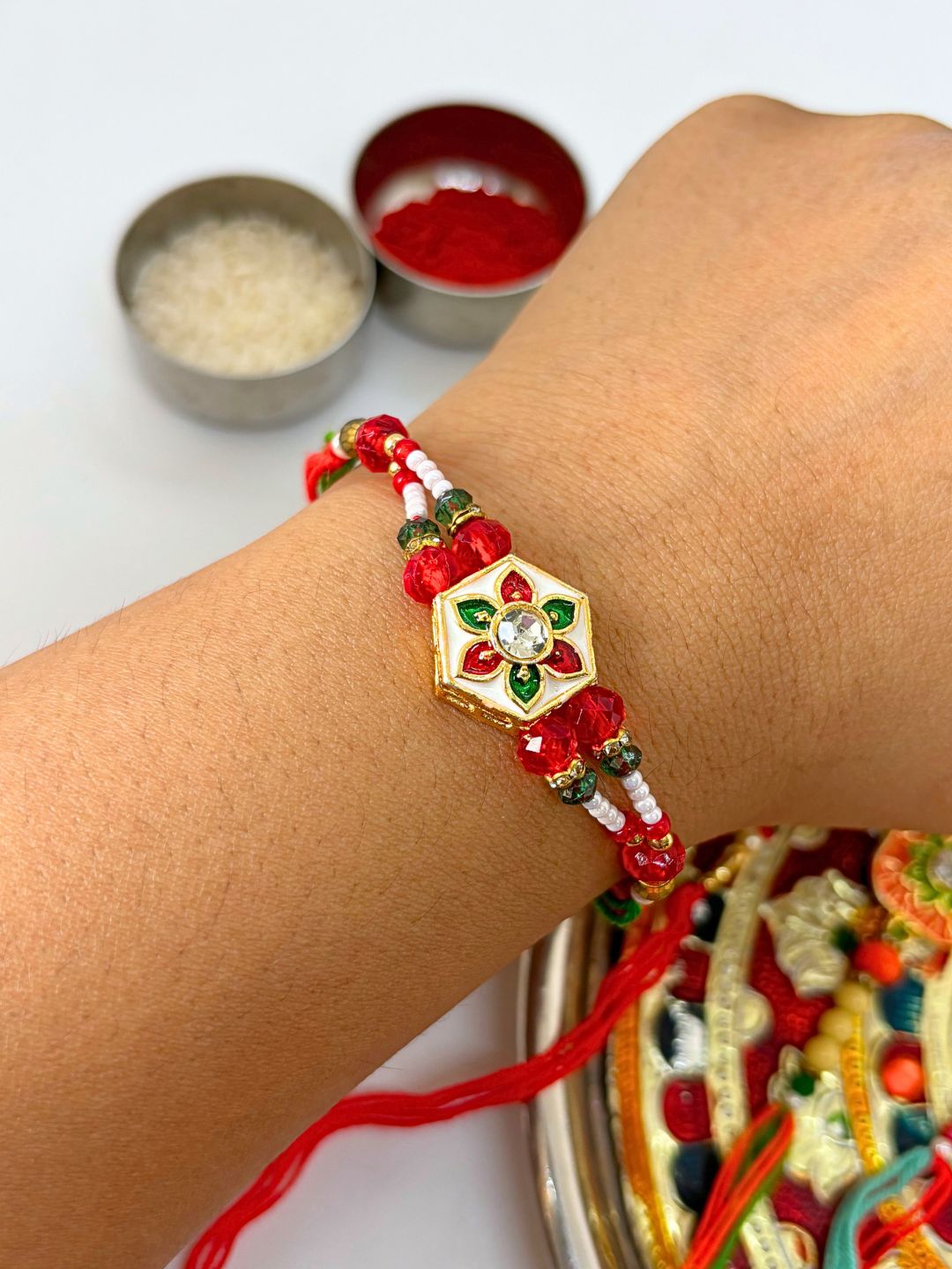 Meenakari Rakhi with Roli Chawal for Brother in Floral Accent