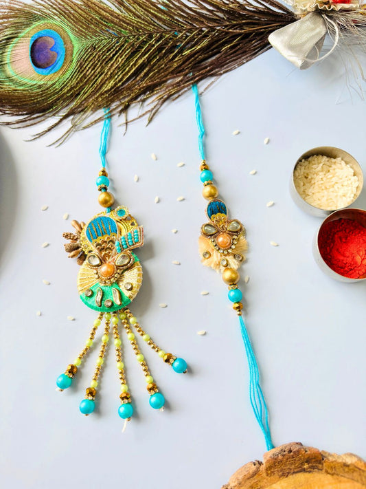 Blue Embellished Lumba Rakhi Set for Bhaiya Bhabhi with Roli Chawal