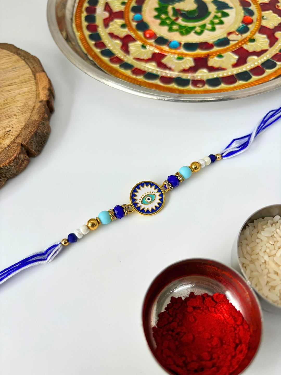Evil Eye Enamelled Rakhi with Roli Chawal