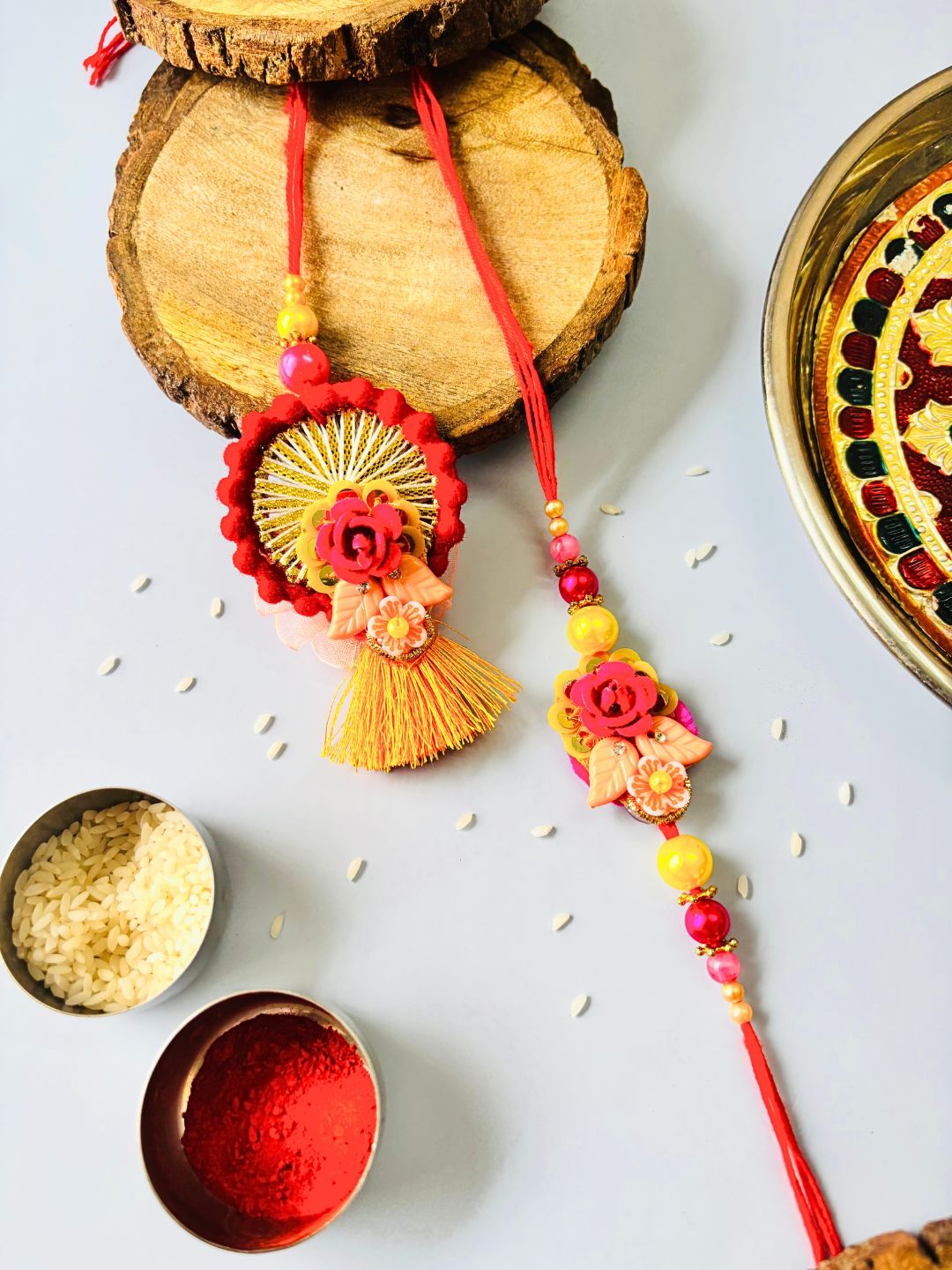 Multicolor Floral Lumba Rakhi Set for Bhaiya Bhabhi with Roli Chawal