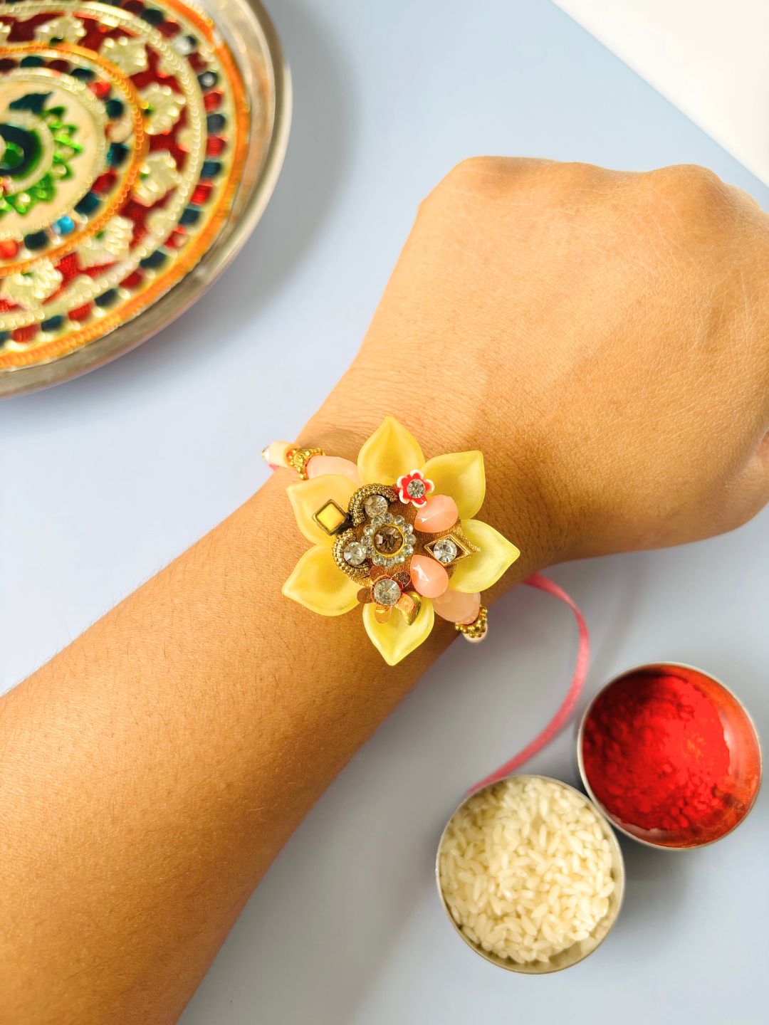 Embellished Floral Rakhi with Roli Chawal for Brother (Pack of 3)