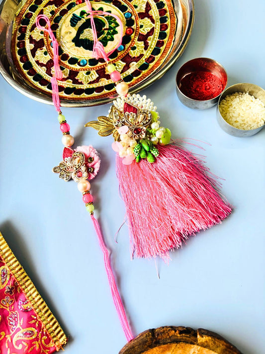 Pink Embellished Lumba Rakhi Set for Bhaiya Bhabhi with Roli Chawal