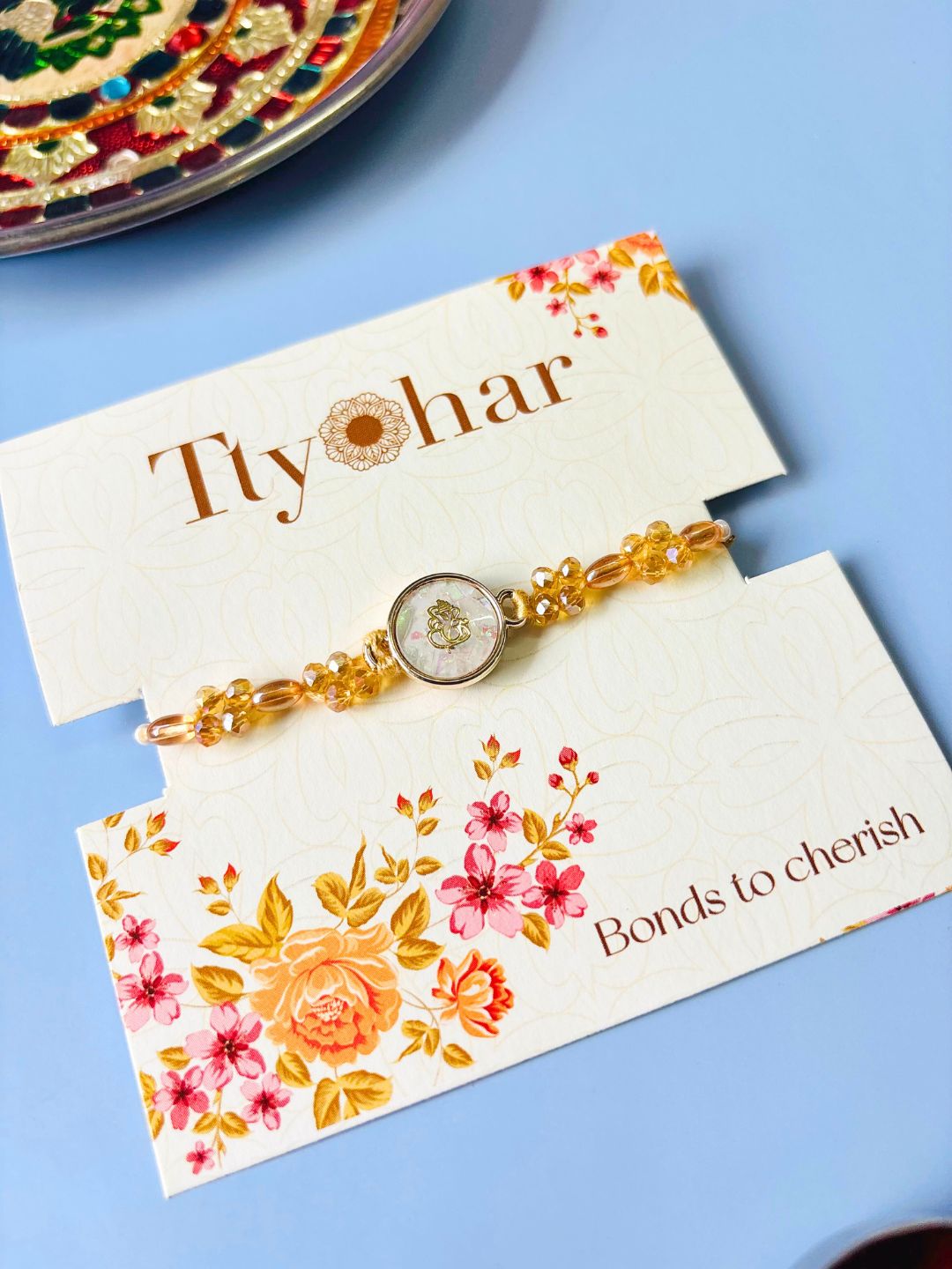 Ganeshji MOP Stone Embellished Rakhi with Roli Chawal for Brother