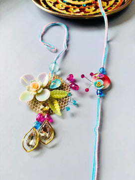 Multicolor Floral Lumba Rakhi Set for Bhaiya Bhabhi with Roli Chawal