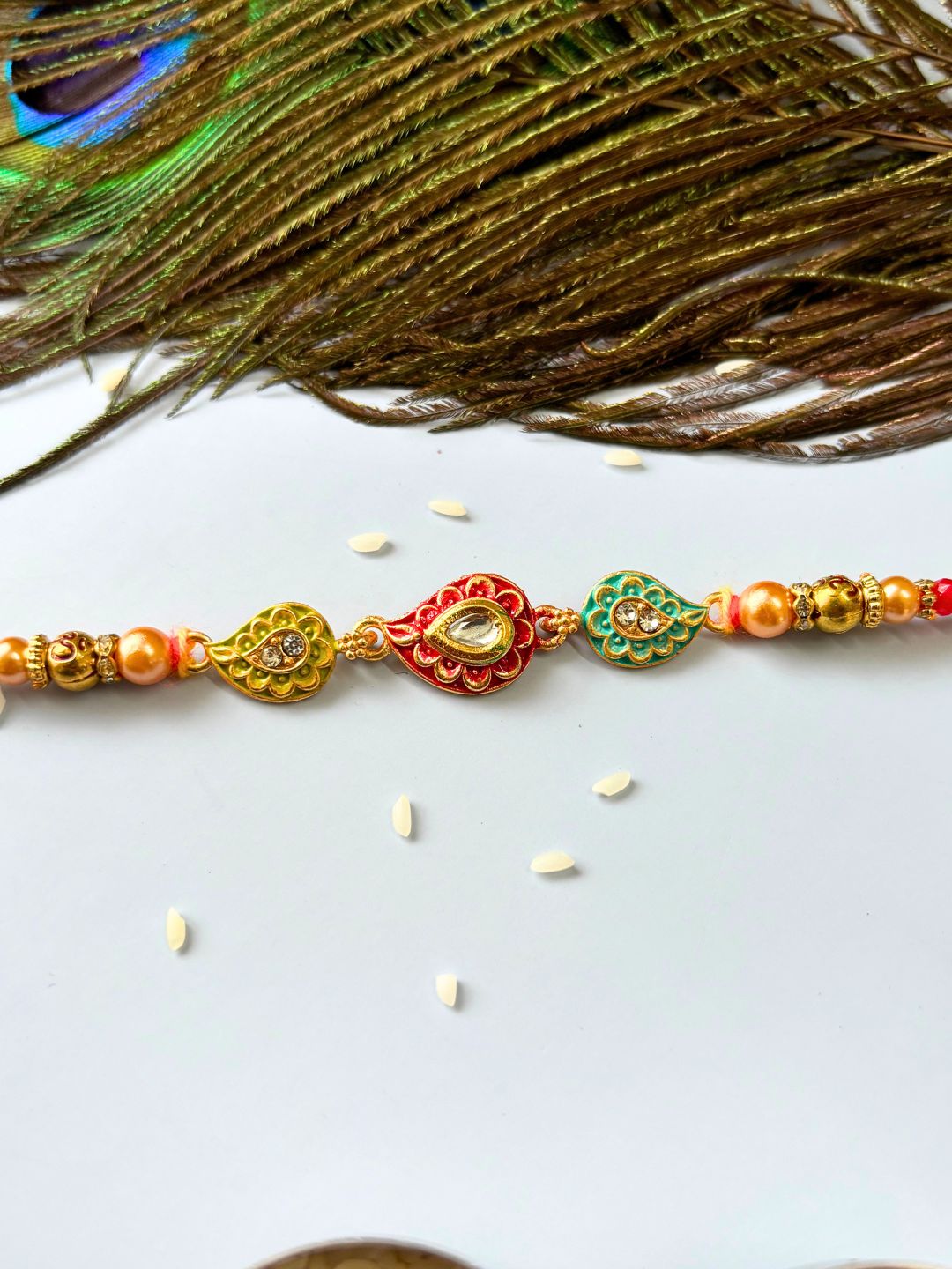 Cute Kairiya Stone Rakhi with Roli Chawal for Brother (Multicolor)