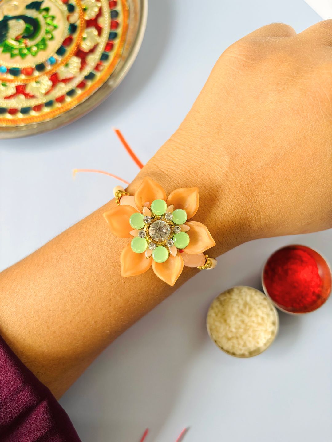 Embellished Floral Rakhi with Roli Chawal for Brother (Pack of 3)