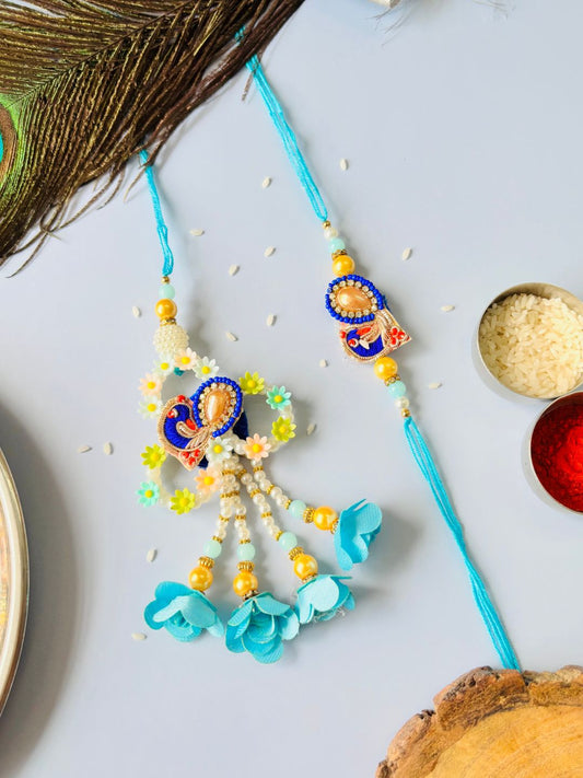 Blue Embellished Lumba Rakhi Set for Bhaiya Bhabhi with Roli Chawal