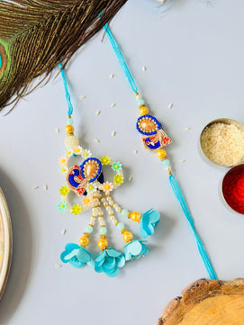 Blue Embellished Lumba Rakhi Set for Bhaiya Bhabhi with Roli Chawal