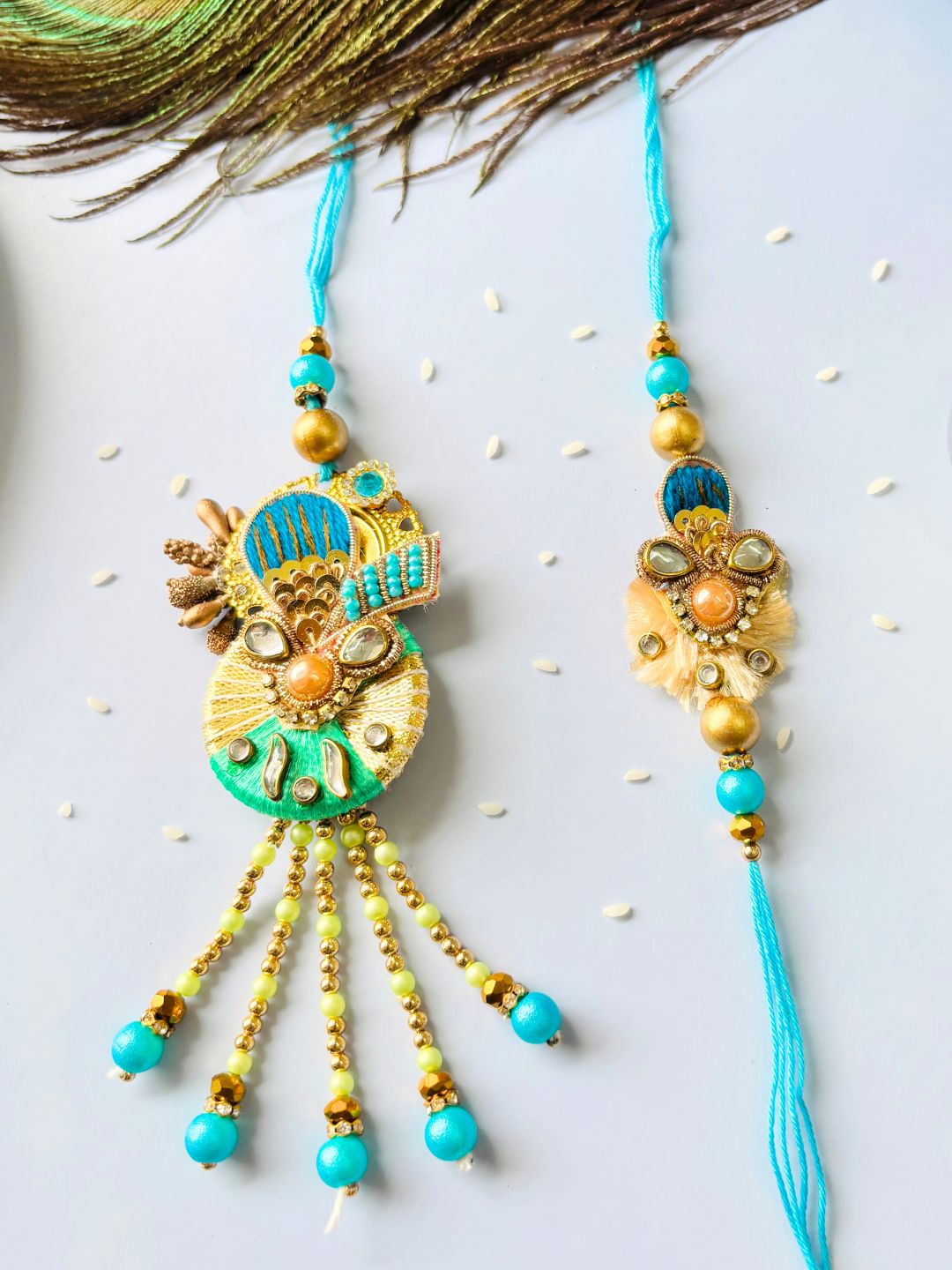 Blue Embellished Lumba Rakhi Set for Bhaiya Bhabhi with Roli Chawal