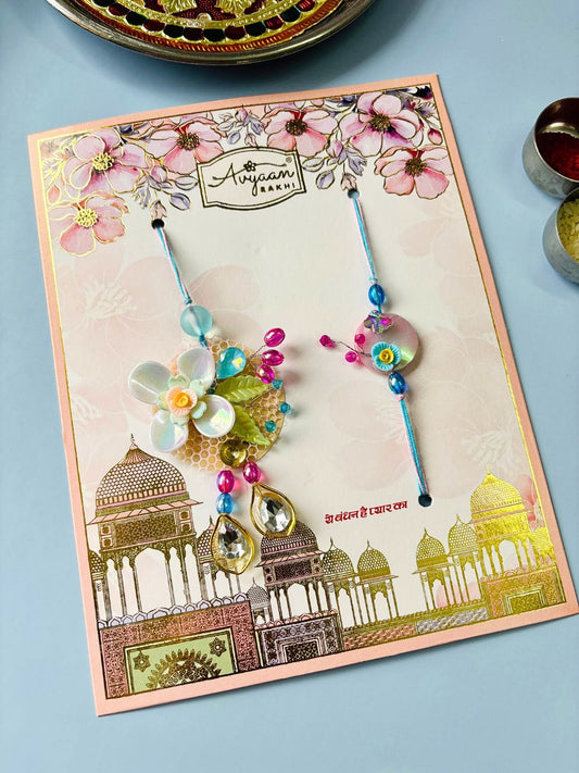Multicolor Floral Lumba Rakhi Set for Bhaiya Bhabhi with Roli Chawal