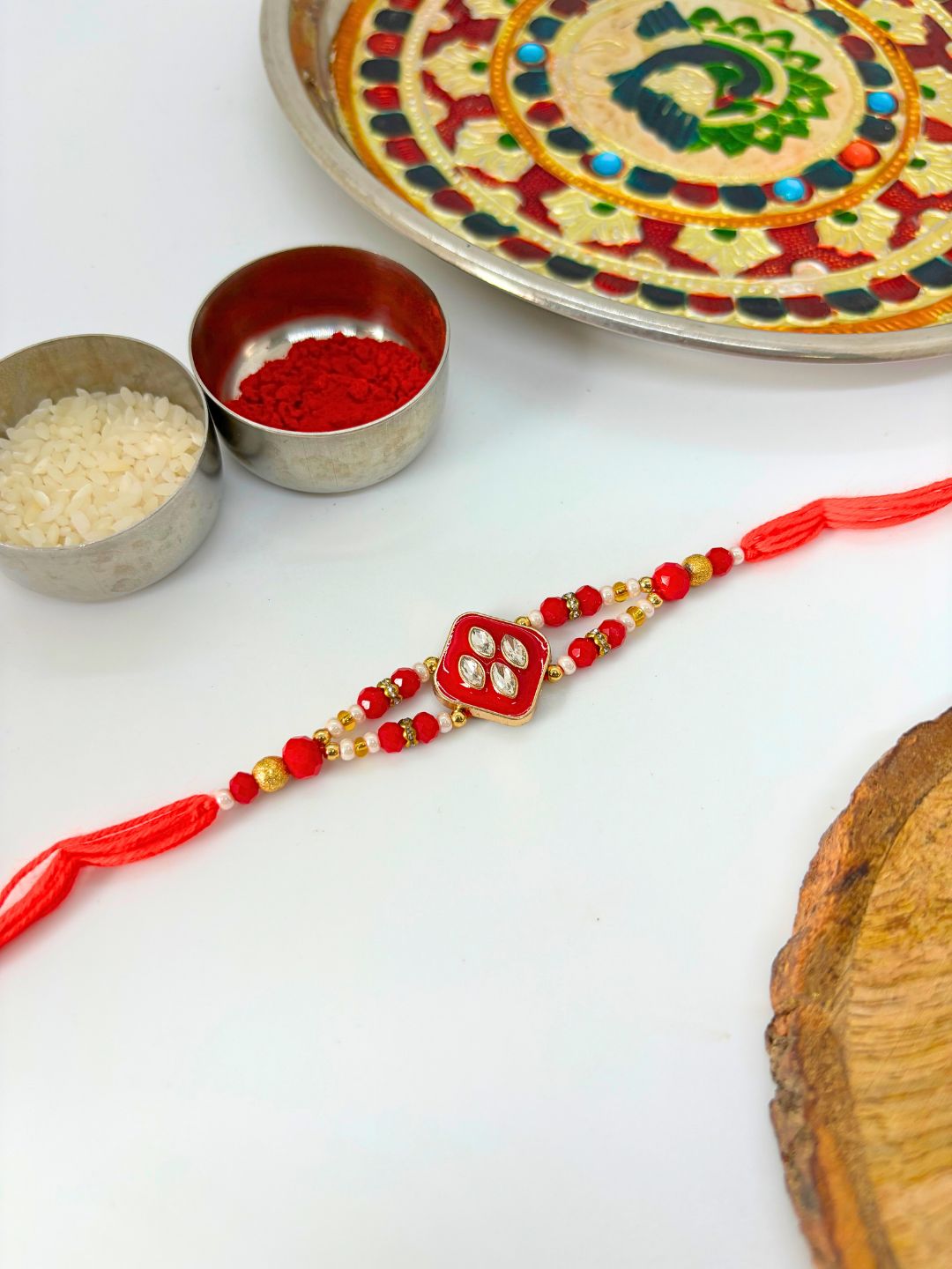 Traditional Meenakari Kundan Rakhi with Roli Chawal for Brother - Red (Pack of 2)