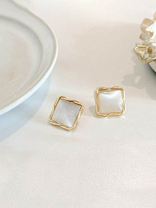 White Stud Earrings