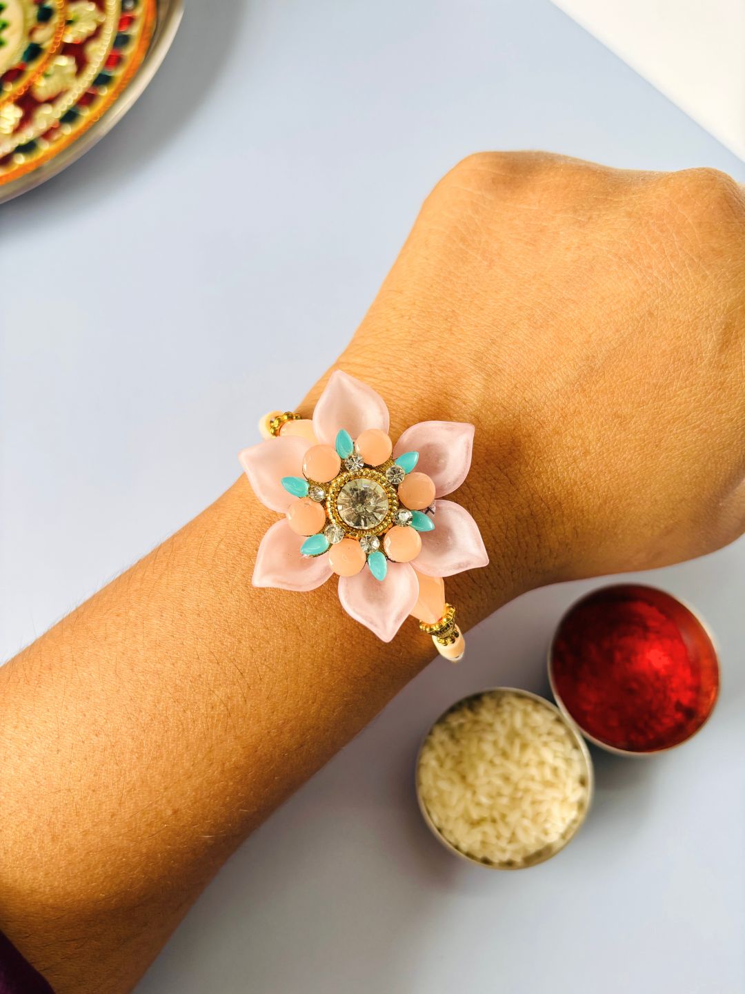 Embellished Floral Rakhi with Roli Chawal for Brother (Pack of 3)