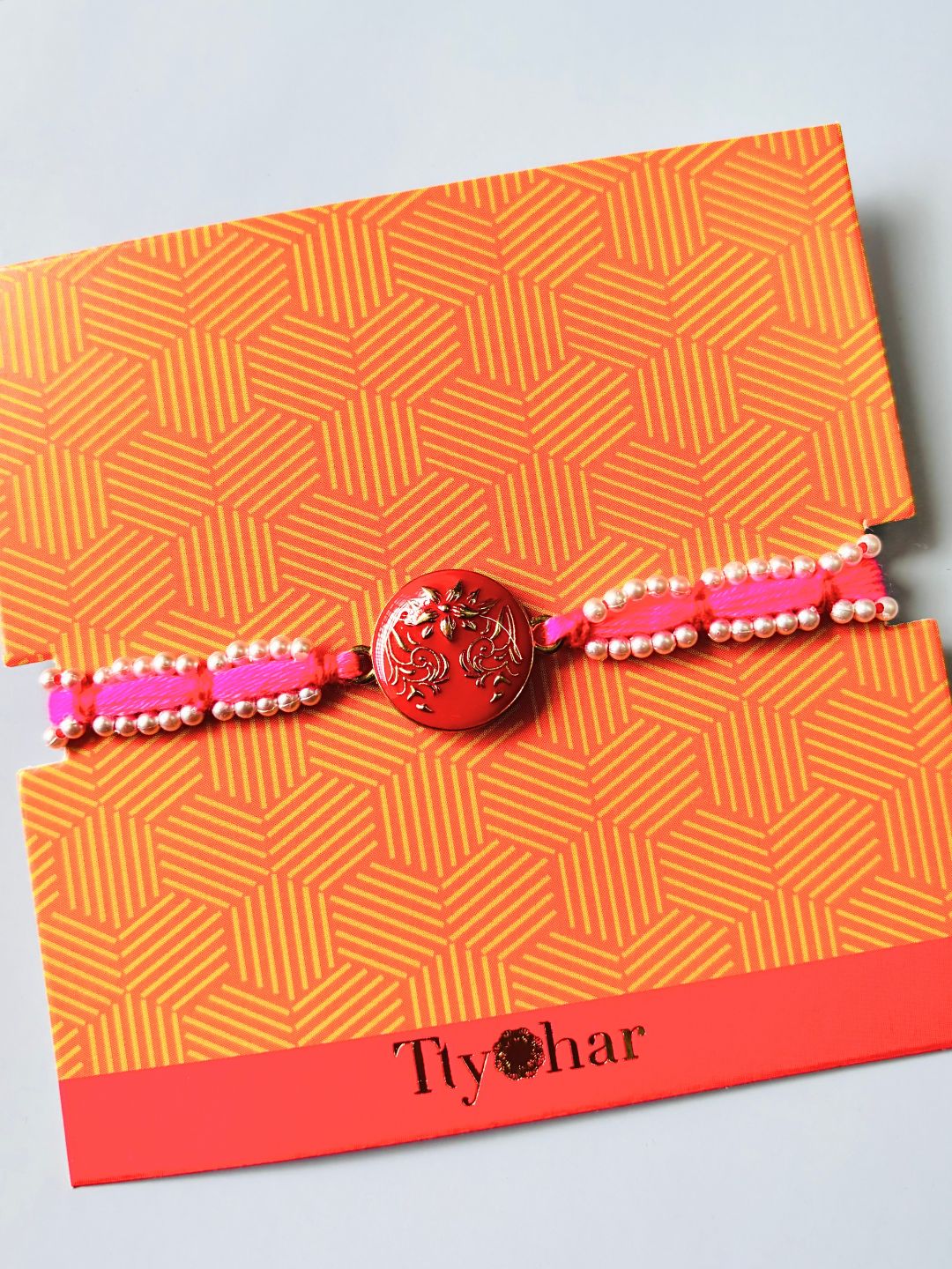 Cute Pink Bracelet Rakhi Bracelet with Roli Chawal for Sister