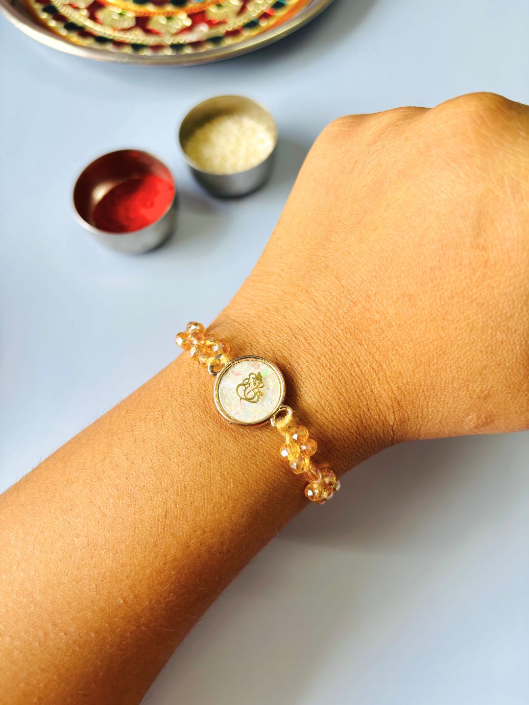 Ganeshji MOP Stone Embellished Rakhi with Roli Chawal for Brother