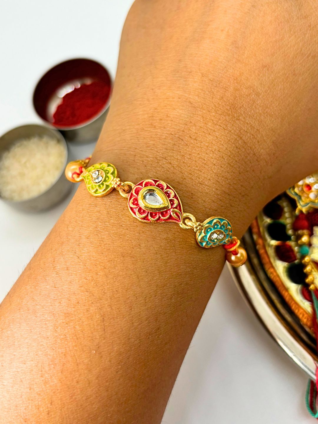 Cute Kairiya Stone Rakhi with Roli Chawal for Brother (Multicolor)