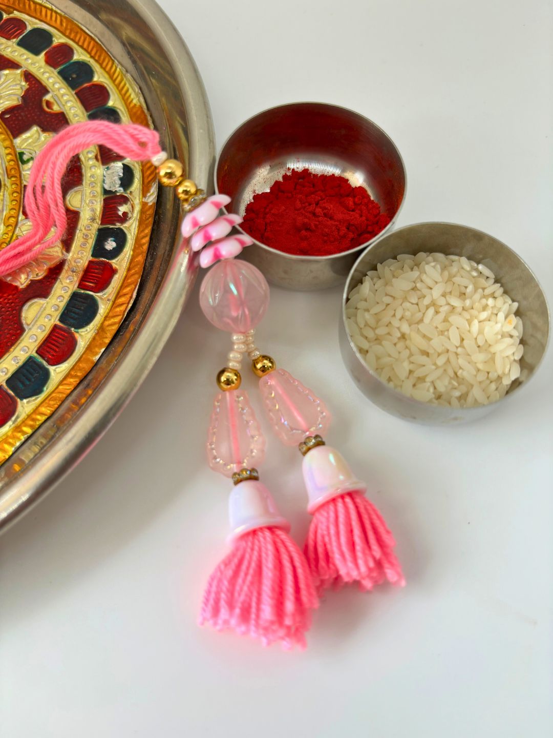 Pink Tassel Lumba Rakhi with Roli Chawal