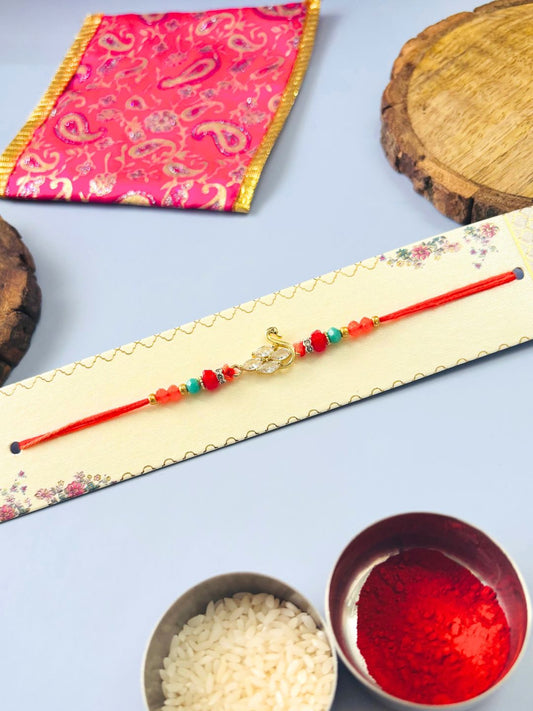 AD Stone Rakhi with Swan Accent with Roli Chawal for Brother