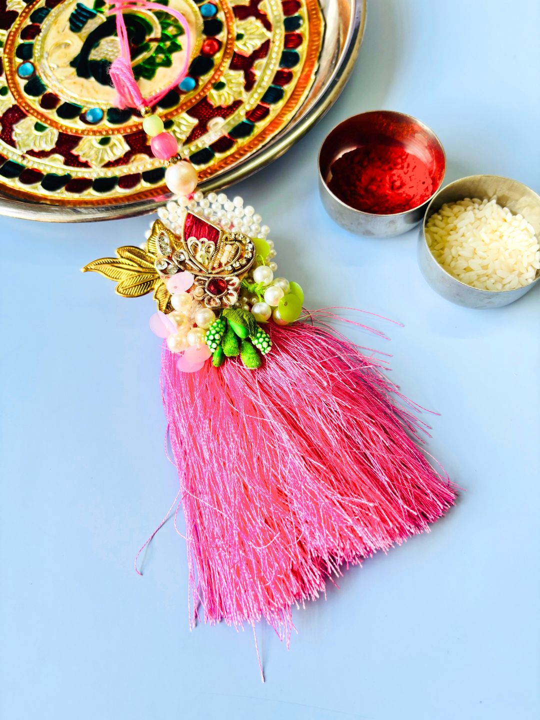 Pink Embellished Lumba Rakhi Set for Bhaiya Bhabhi with Roli Chawal