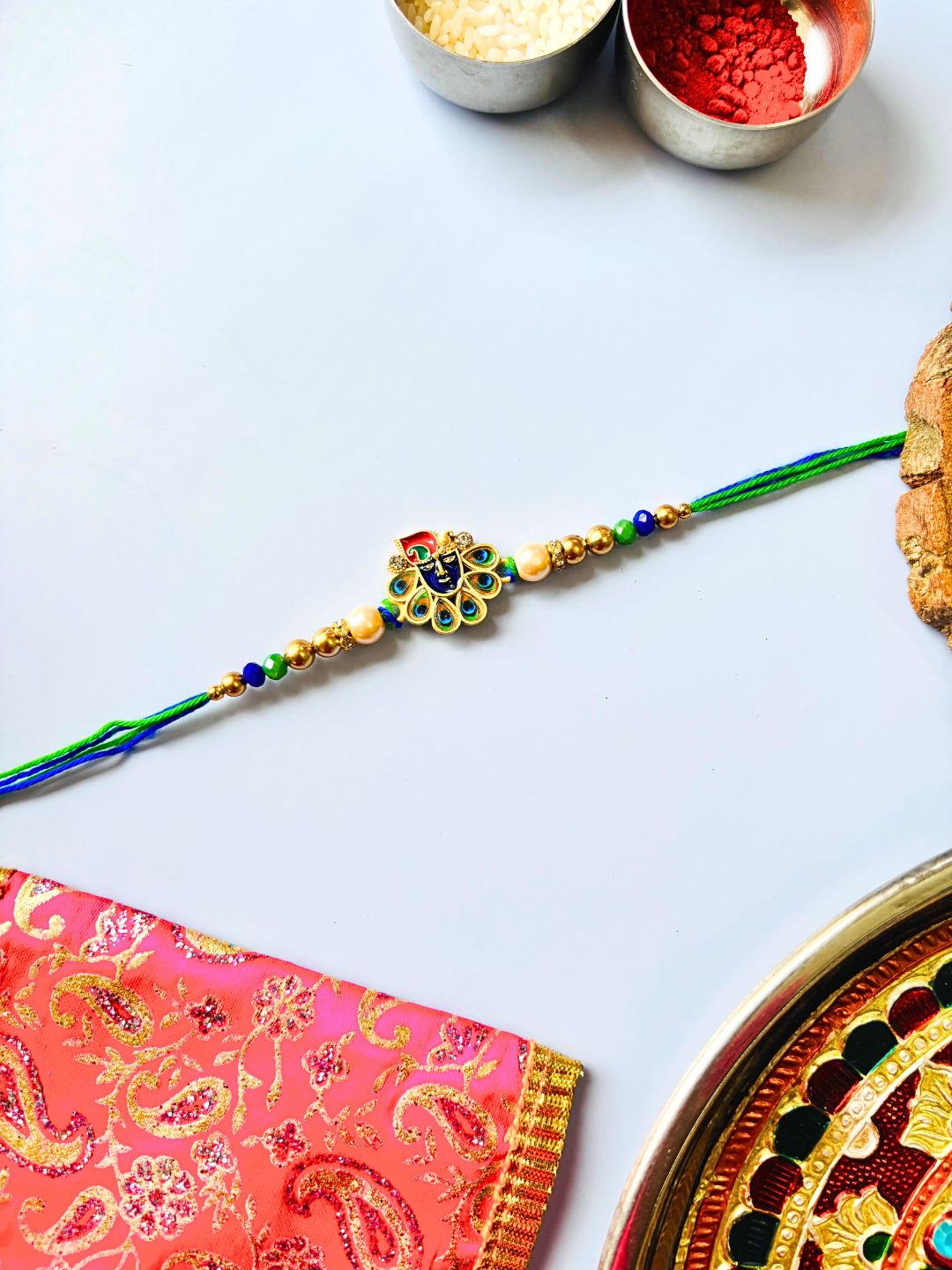 Traditional Krishna ji Kundan Meenakari Rakhi with Roli Chawal