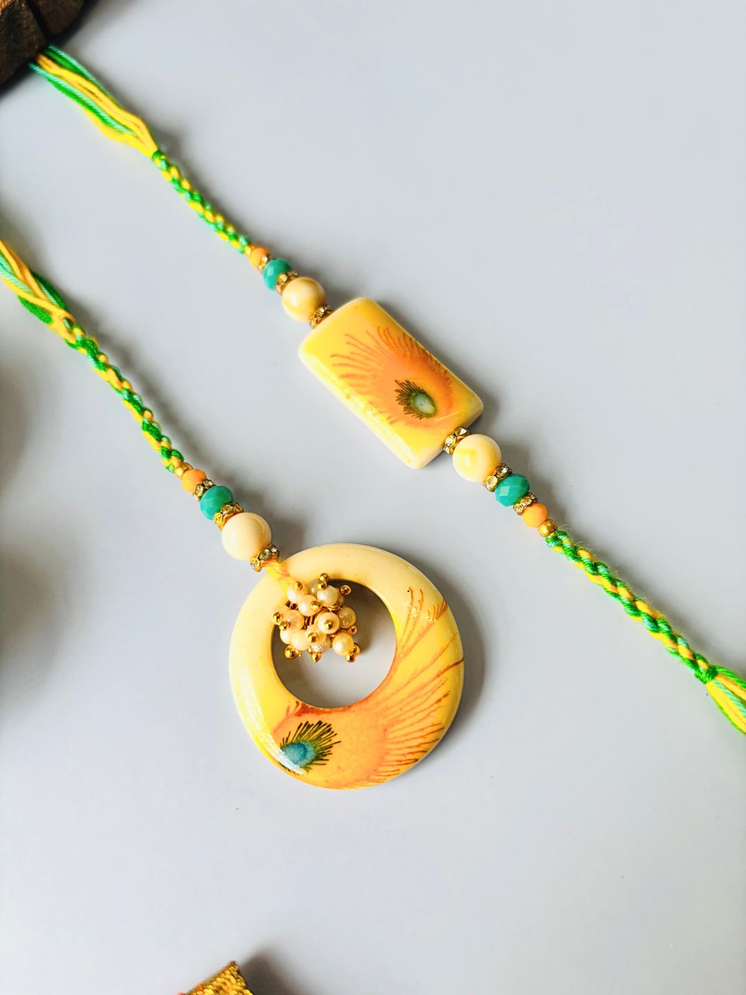 Resin Morpankh Lumba Rakhi Set for Bhaiya Bhabhi with Roli Chawal