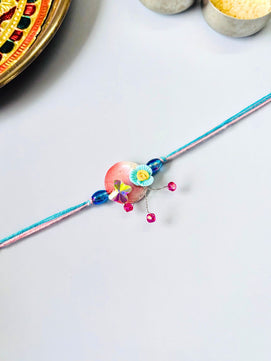 Multicolor Floral Lumba Rakhi Set for Bhaiya Bhabhi with Roli Chawal