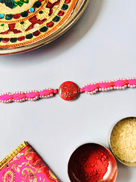 Cute Pink Bracelet Rakhi Bracelet with Roli Chawal for Sister